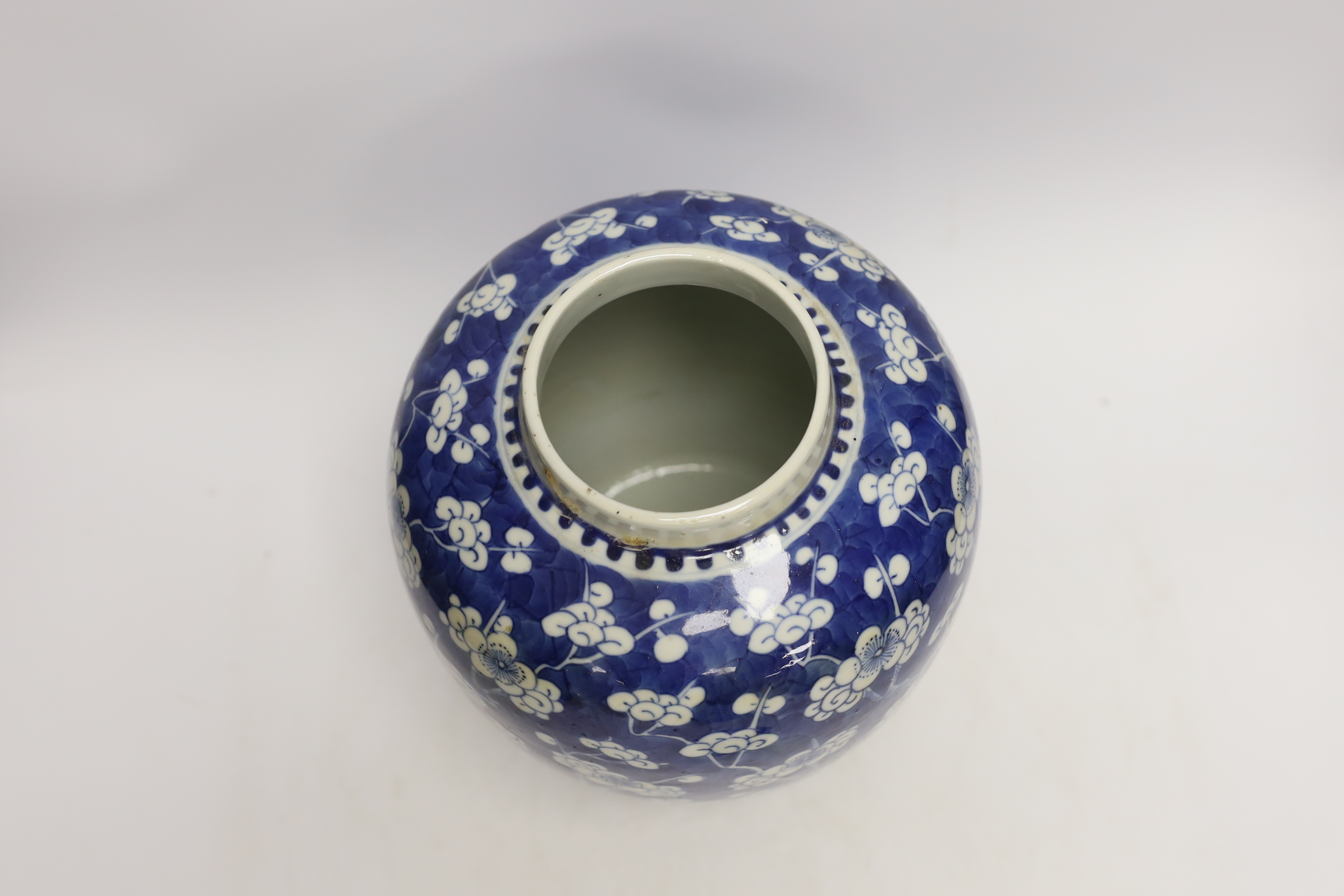 A Chinese blue and white prunus jar and cover, late 19th/early 20th century, 29cm high
